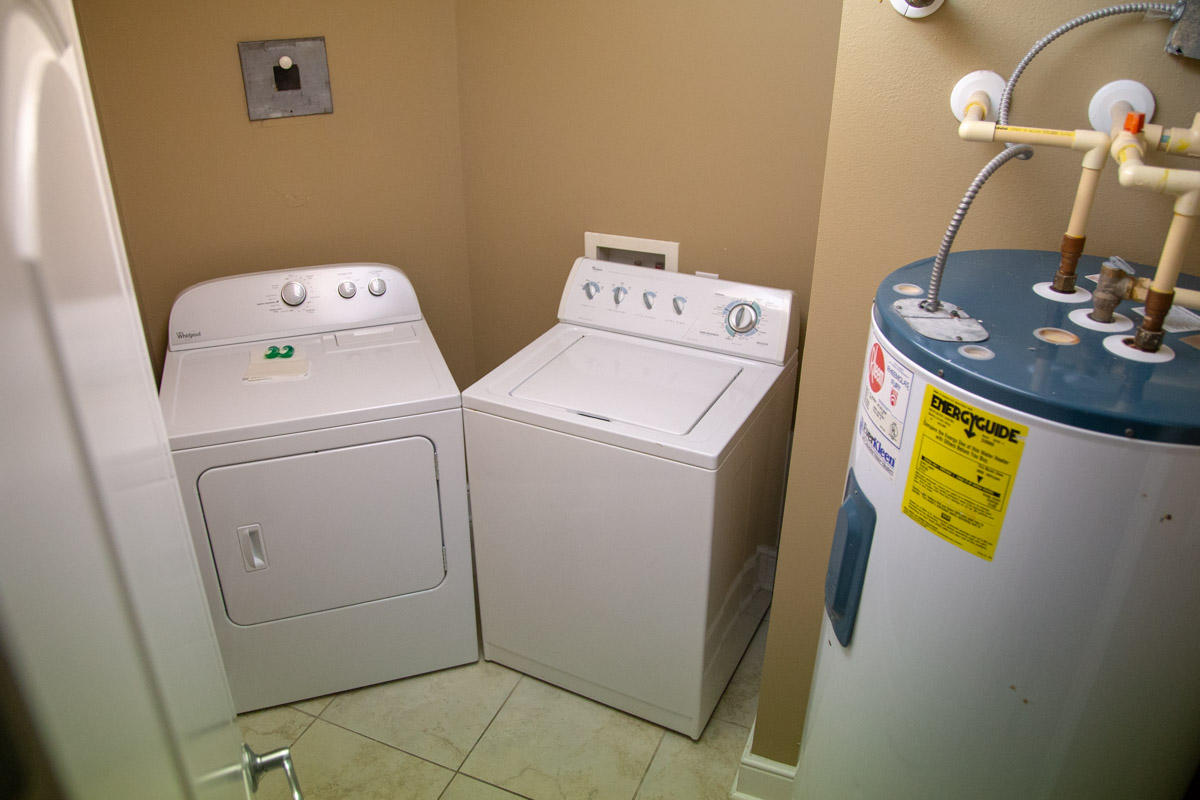 1150 Santa Rosa Boulevard, Unit 223 Fort Walton Beach, FL 32548 - Photo 29 of 35 a utility room with dryer and washer