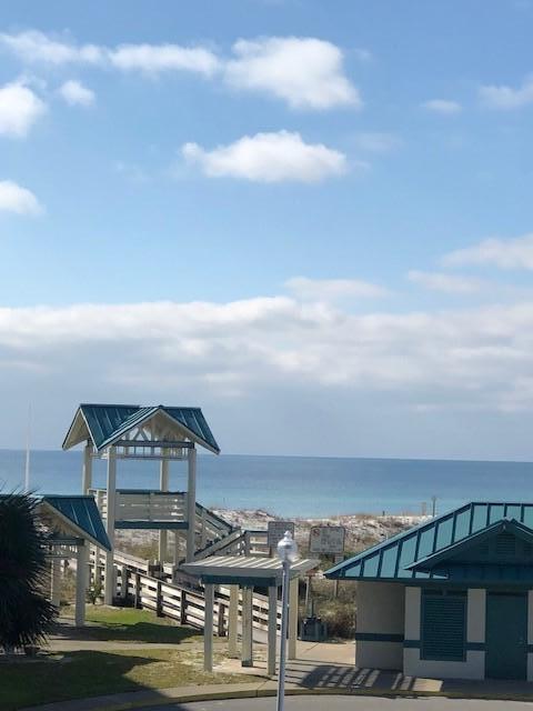 1150 Santa Rosa Boulevard, Unit 223 Fort Walton Beach, FL 32548 - Photo 6 of 35 a view of a big yard in front of the house