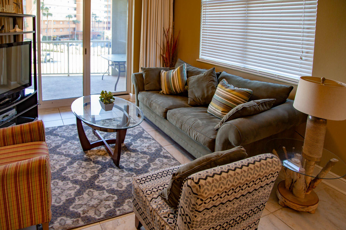 1150 Santa Rosa Boulevard, Unit 223 Fort Walton Beach, FL 32548 - Photo 8 of 35 a living room with furniture and a window