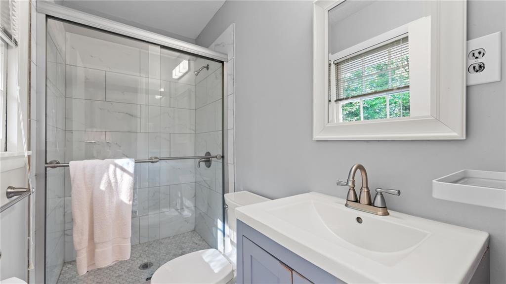 2235 Winding Way Tucker, GA 30084 - Photo 13 of 31 a bathroom with a sink toilet and shower