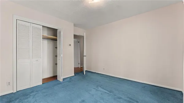 an empty room with closet