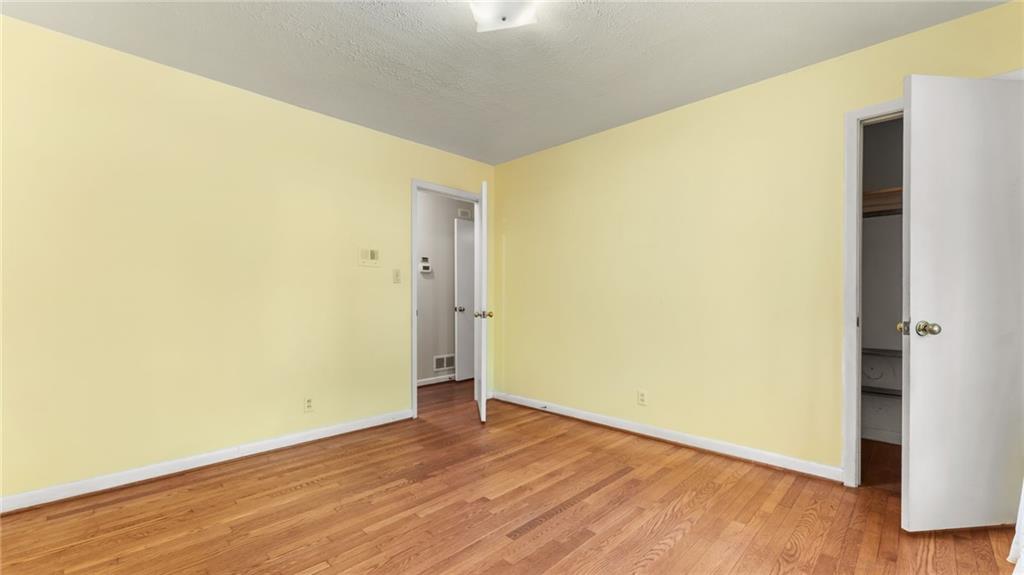 2235 Winding Way Tucker, GA 30084 - Photo 18 of 31 a view of empty room with wooden floor