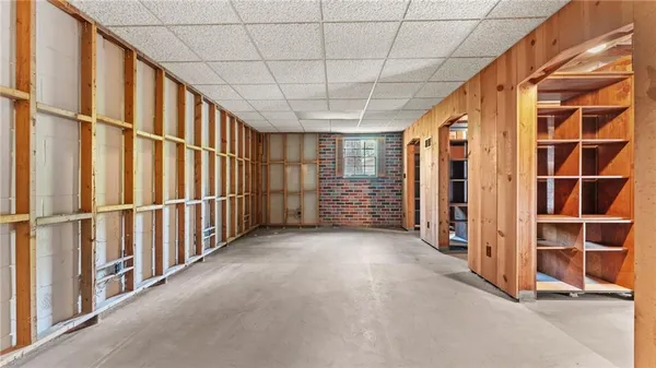 a view of an empty room with stairs