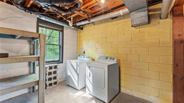 a view of livingroom with furniture and staircase