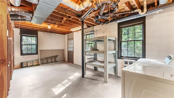 a view of a house with large trees