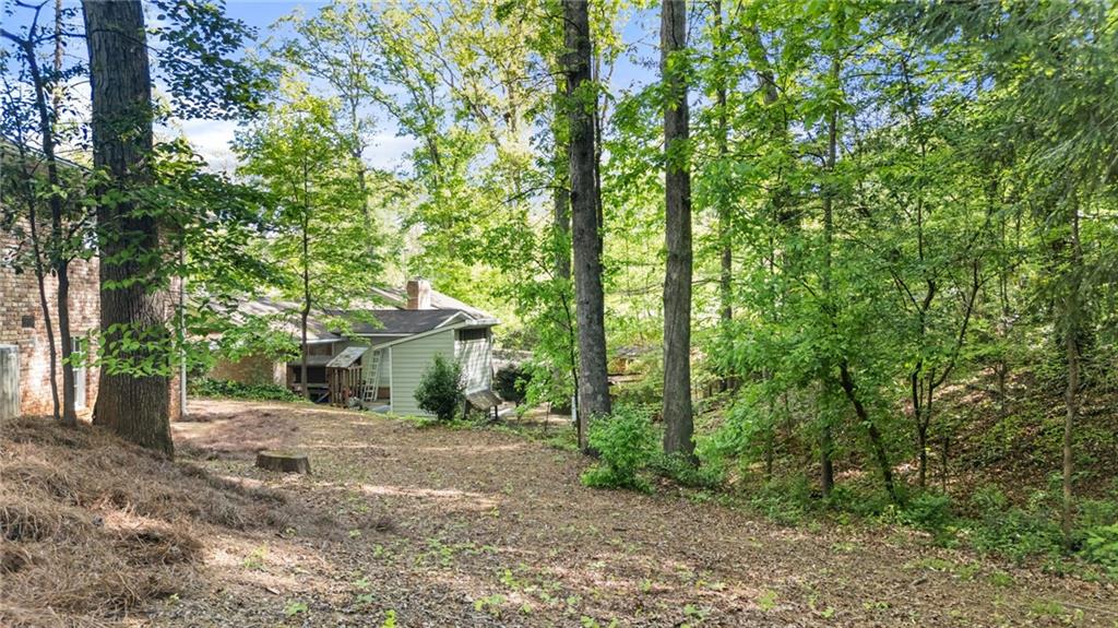 2235 Winding Way Tucker, GA 30084 - Photo 27 of 31 a view of a house with large trees