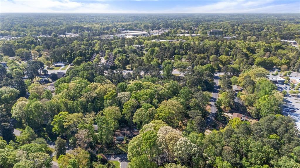 2235 Winding Way Tucker, GA 30084 - Photo 29 of 31 an aerial view of town with residential houses and green space
