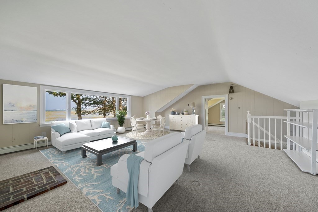 42 Damons Point Circle Marshfield, MA 02050 - Photo 11 of 21 a living room with furniture and a table