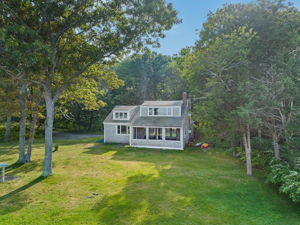 42 Damons Point Circle Marshfield, MA 02050 - Photo 3 of 21 a view of a house with a big yard and large trees