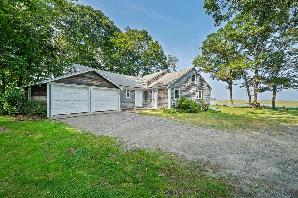 42 Damons Point Circle Marshfield, MA 02050 - Photo 5 of 21 a view of a house with yard and tree s