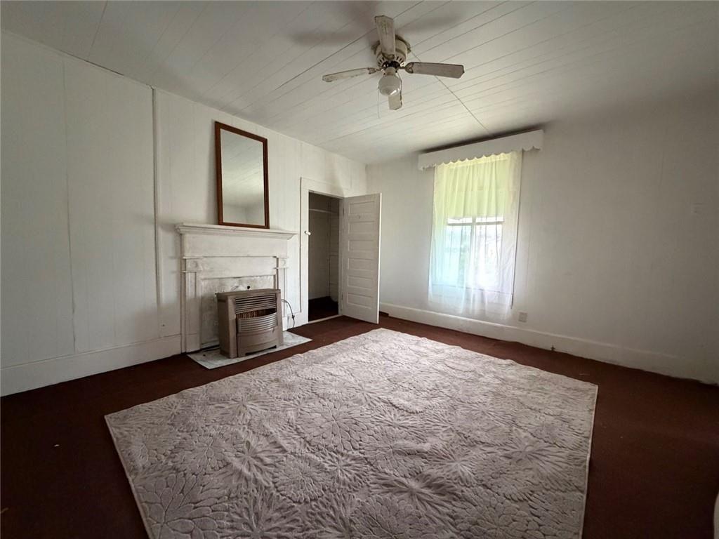 209 Old Perry Road Marshallville, GA 31057 - Photo 5 of 40 a big room with windows and fireplace