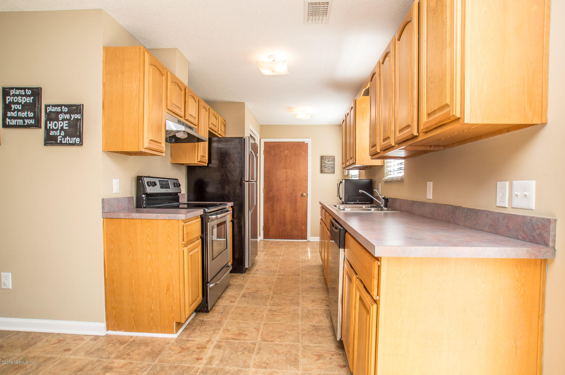 44135 Quail Ridge Avenue East Callahan, FL 32011 - Photo 6 of 15 Kitchen View 2 to Garage