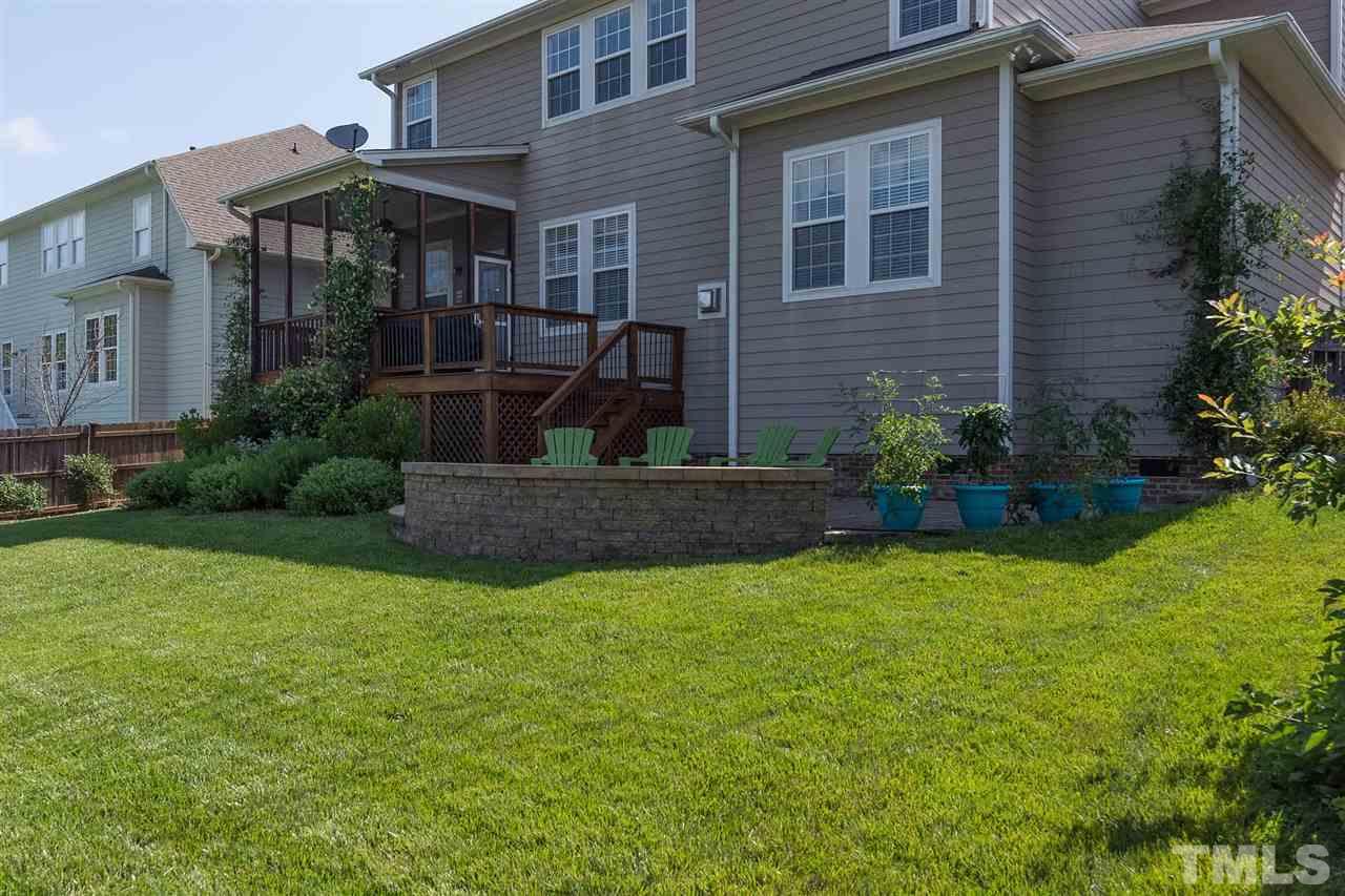 10121 Darling Street Raleigh, NC 27613 - Photo 23 of 25 a house view with a garden space