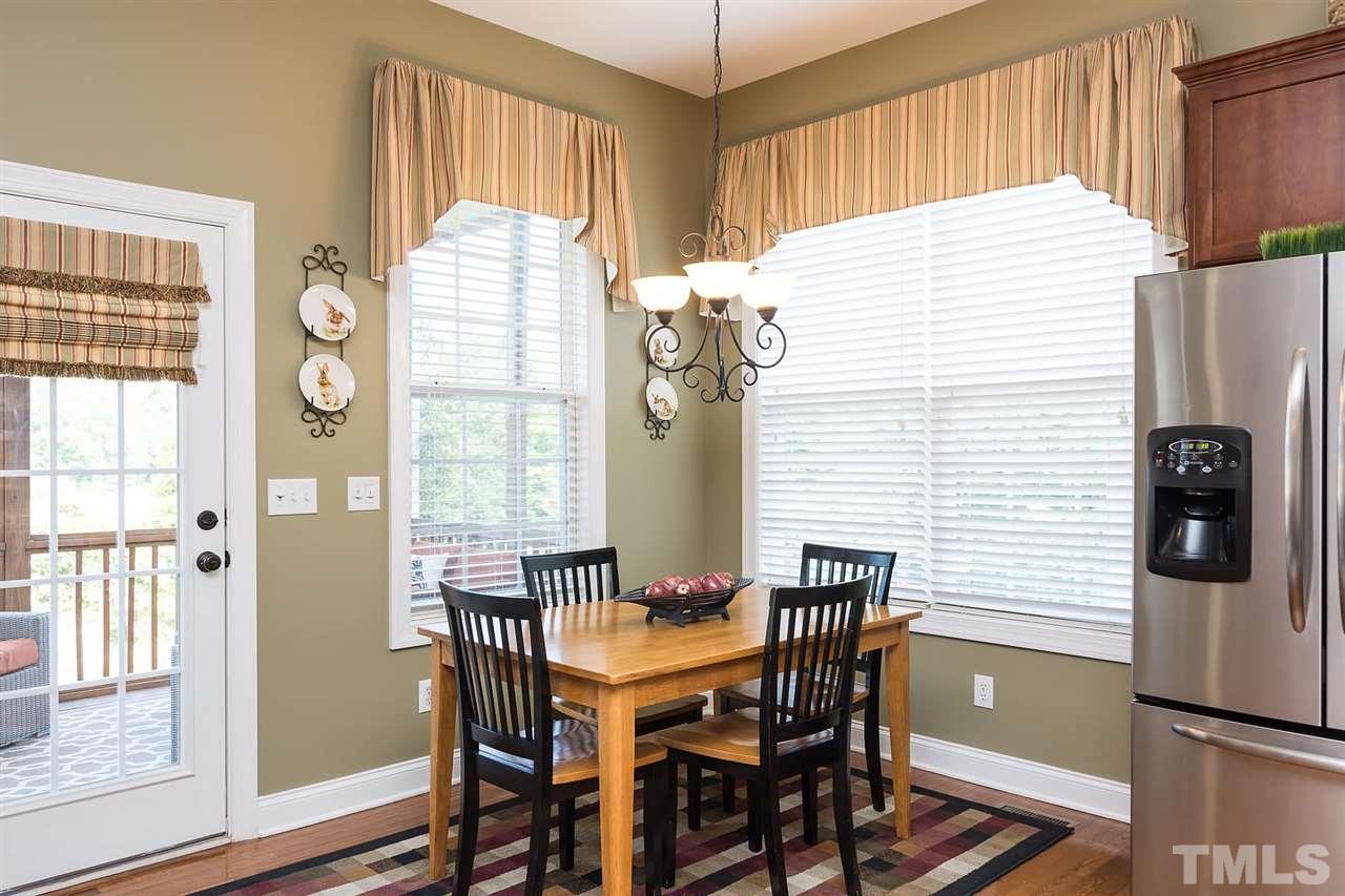 10121 Darling Street Raleigh, NC 27613 - Photo 6 of 25 a dining room with furniture and window