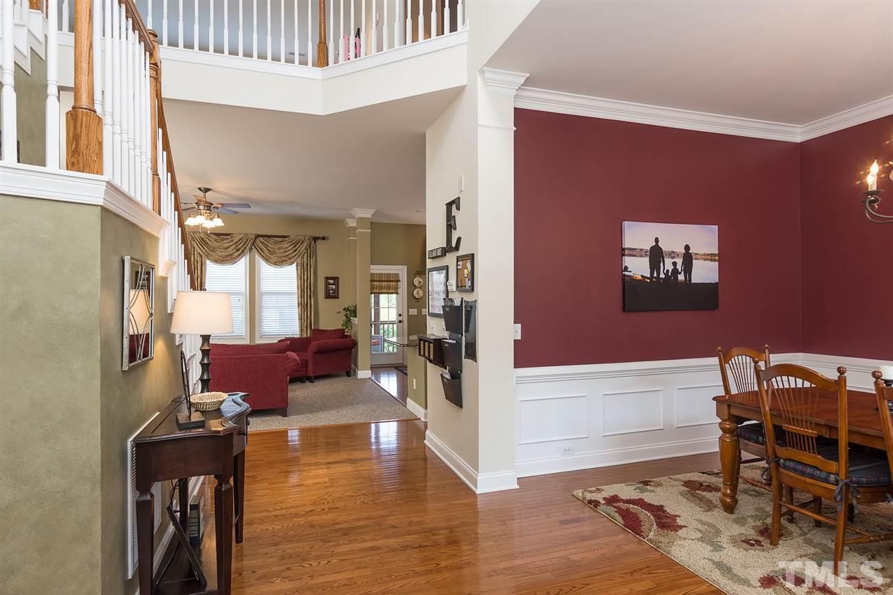 10121 Darling Street Raleigh, NC 27613 - Photo 9 of 25 a living room with furniture and a table
