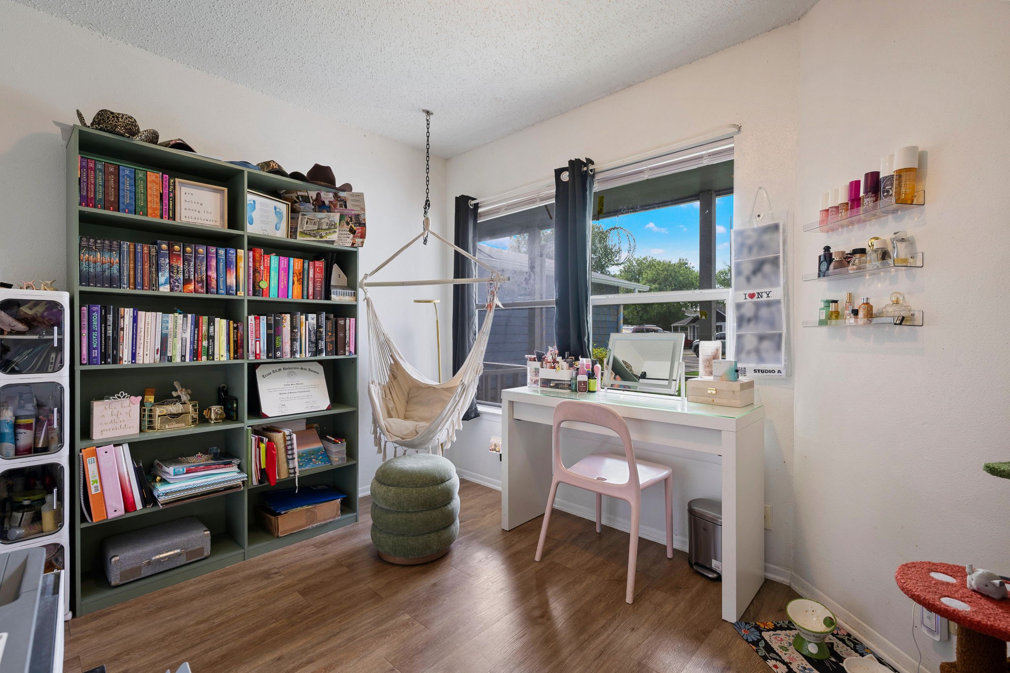8317 Forest Ridge Drive San Antonio, TX 78239 - Photo 16 of 26 Natural light illuminates this versatile room, perfect for reading or creative endeavors.