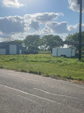 a view of a lake from a yard