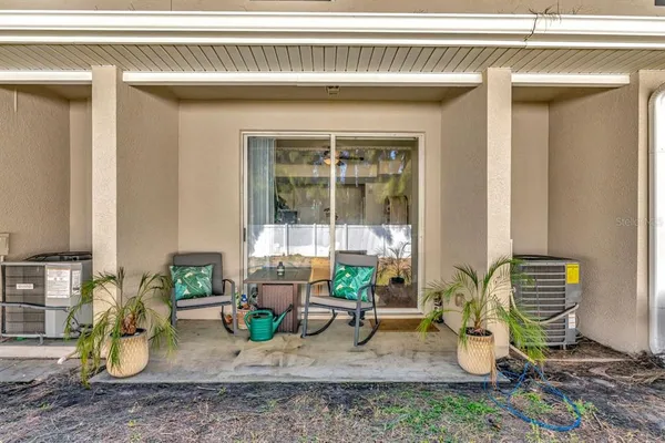 a view of a swimming pool with a lounge chair
