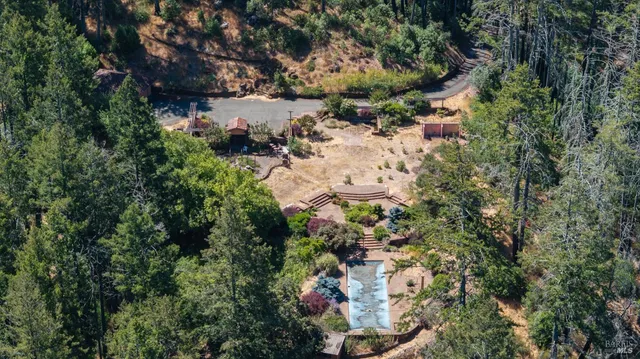 an aerial view of residential house with outdoor space