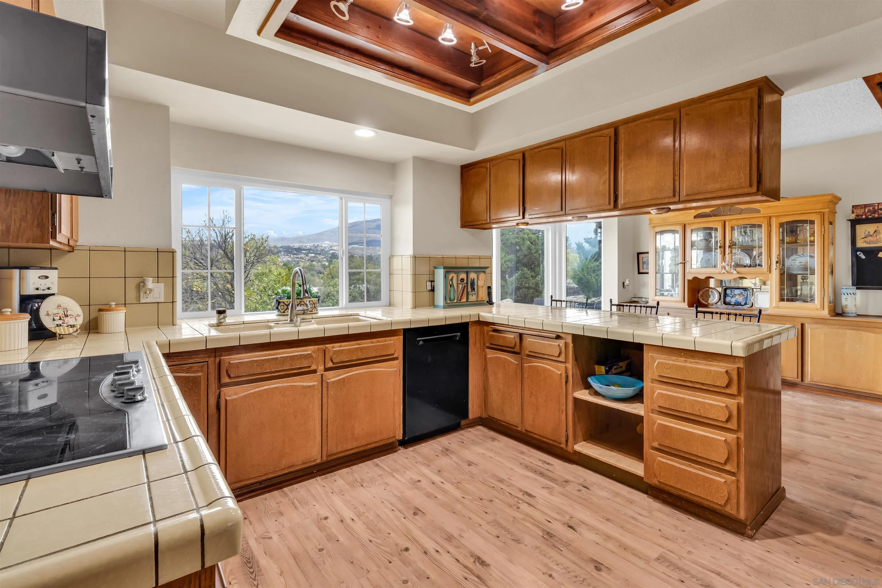 1619 Roble Grande Road Alpine, CA 91901 - Photo 11 of 20 a kitchen with stainless steel appliances granite countertop a stove and a sink