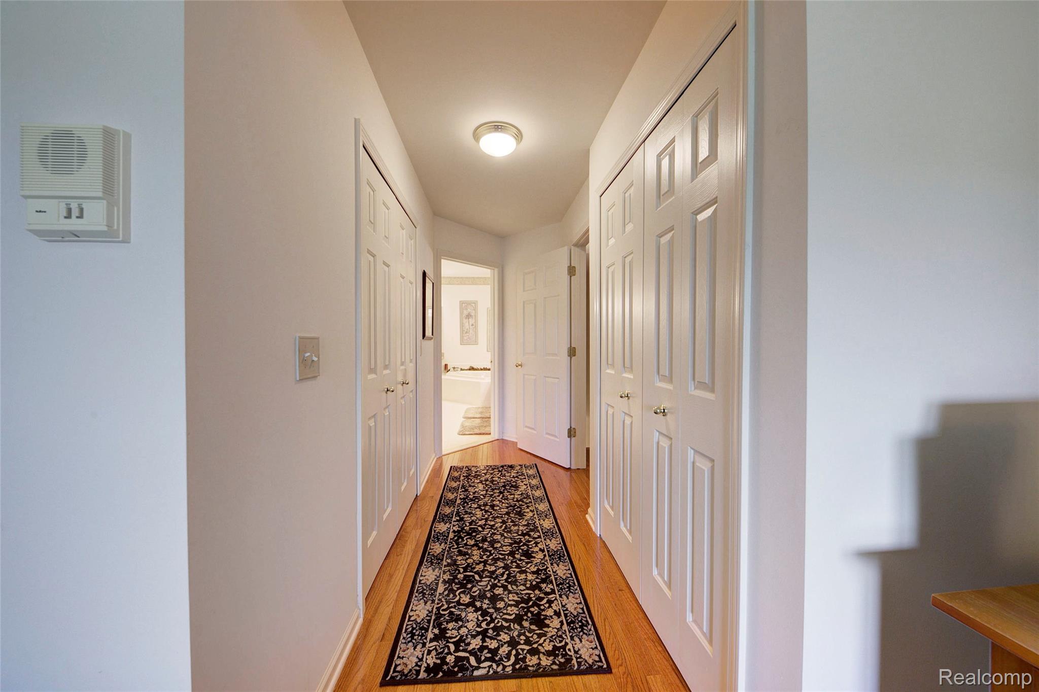 2577 Cleveland Way Canton, MI 48188 - Photo 23 of 34 Corridor featuring light wood finished floors