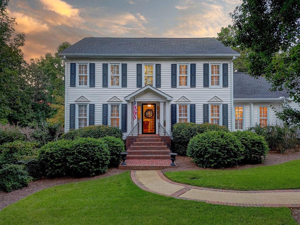 101 Saddle Mountain Road Southeast Rome, GA 30161 - Photo 1 of 1 a front view of a house with garden