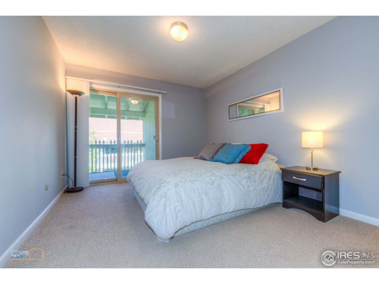 2707 Valmont Road, Unit 306A Boulder, CO 80304 - Photo 12 of 25 a bedroom with a bed and a window