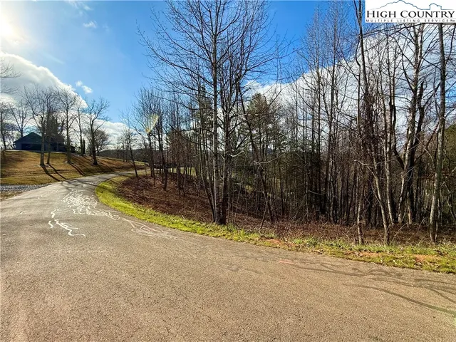 a picture of a bathroom with a shower