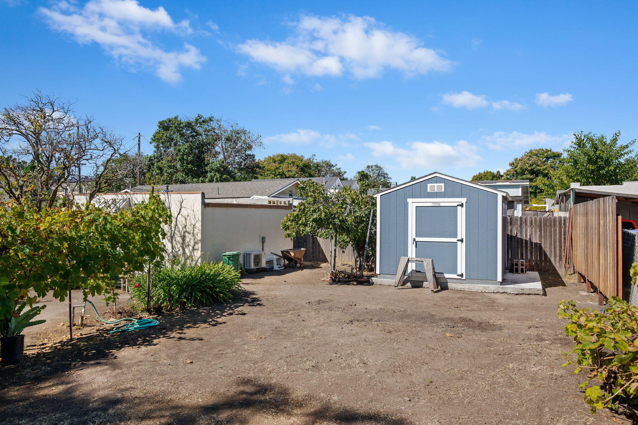 834 West Valerio Street Santa Barbara, CA 93101 - Photo 11 of 12 a view of a house with a yard and large trees