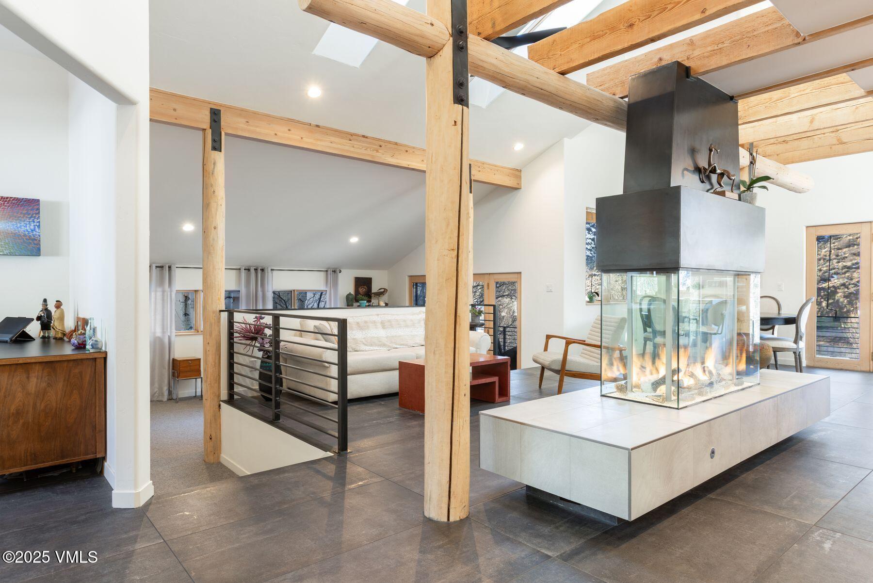 960 June Creek Road Edwards, CO 81632 - Photo 12 of 43 a living room with furniture and a table