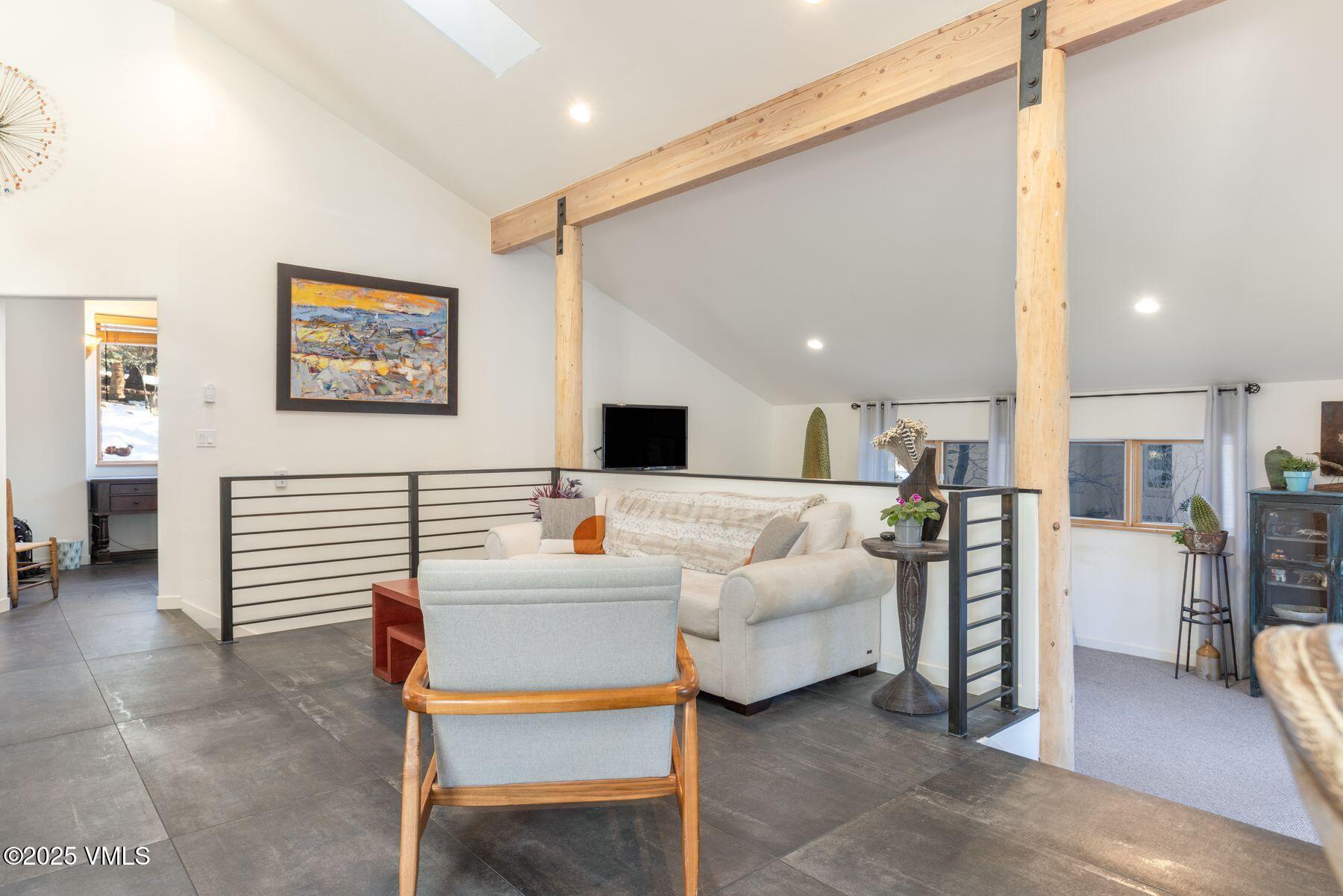 960 June Creek Road Edwards, CO 81632 - Photo 15 of 43 a living room with furniture and kitchen view