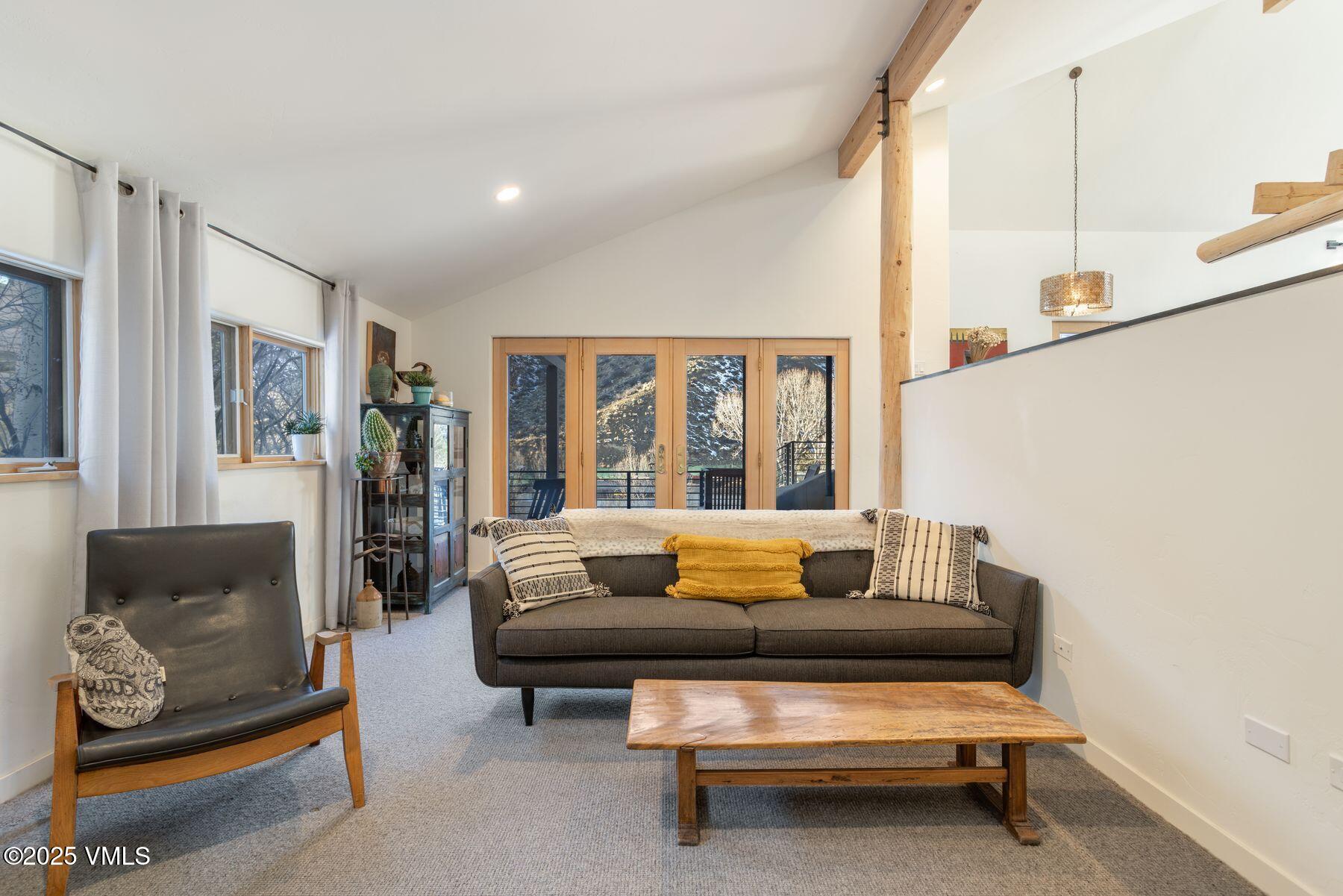 960 June Creek Road Edwards, CO 81632 - Photo 16 of 43 a living room with furniture and a rug