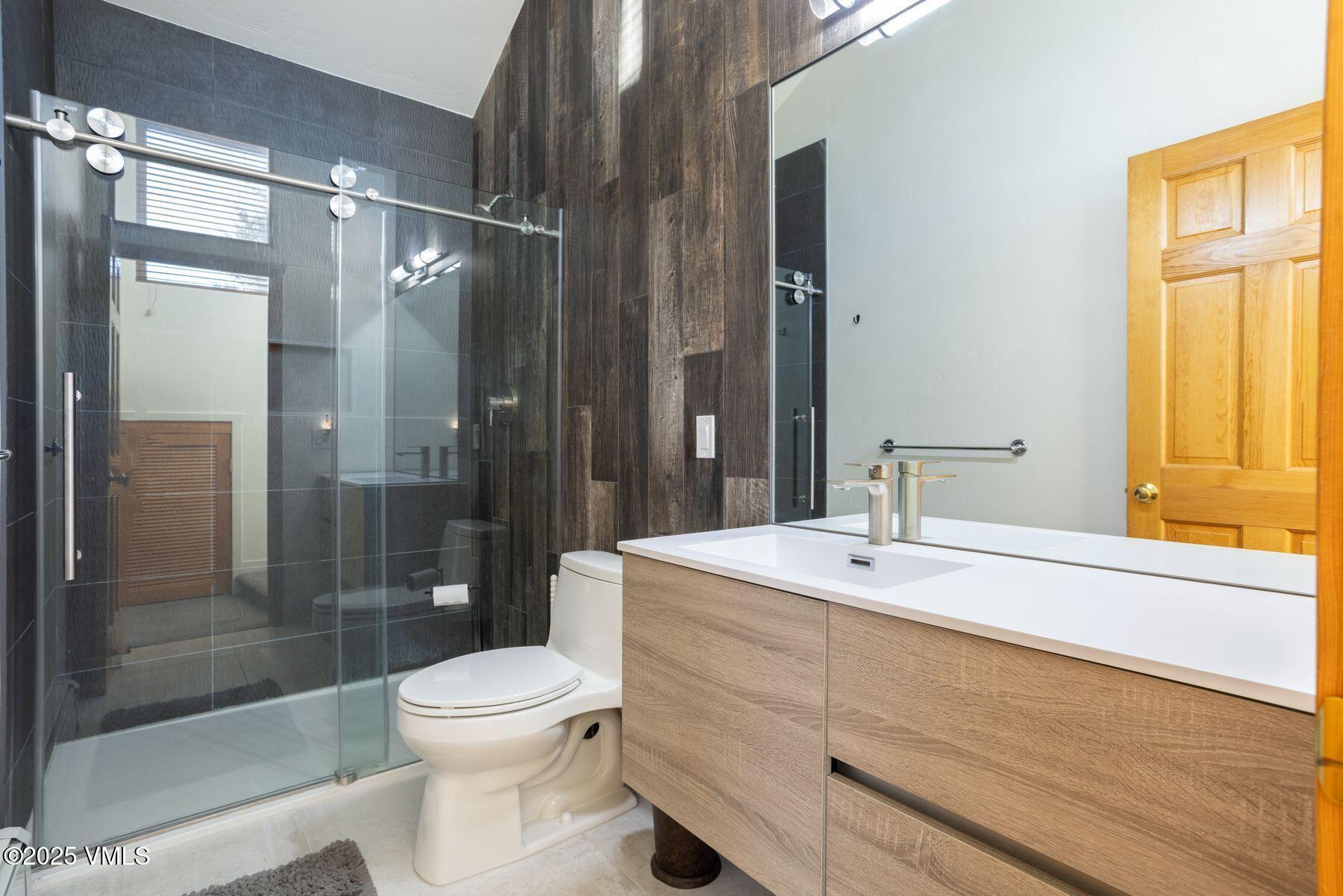 960 June Creek Road Edwards, CO 81632 - Photo 25 of 43 a bathroom with a sink toilet and shower