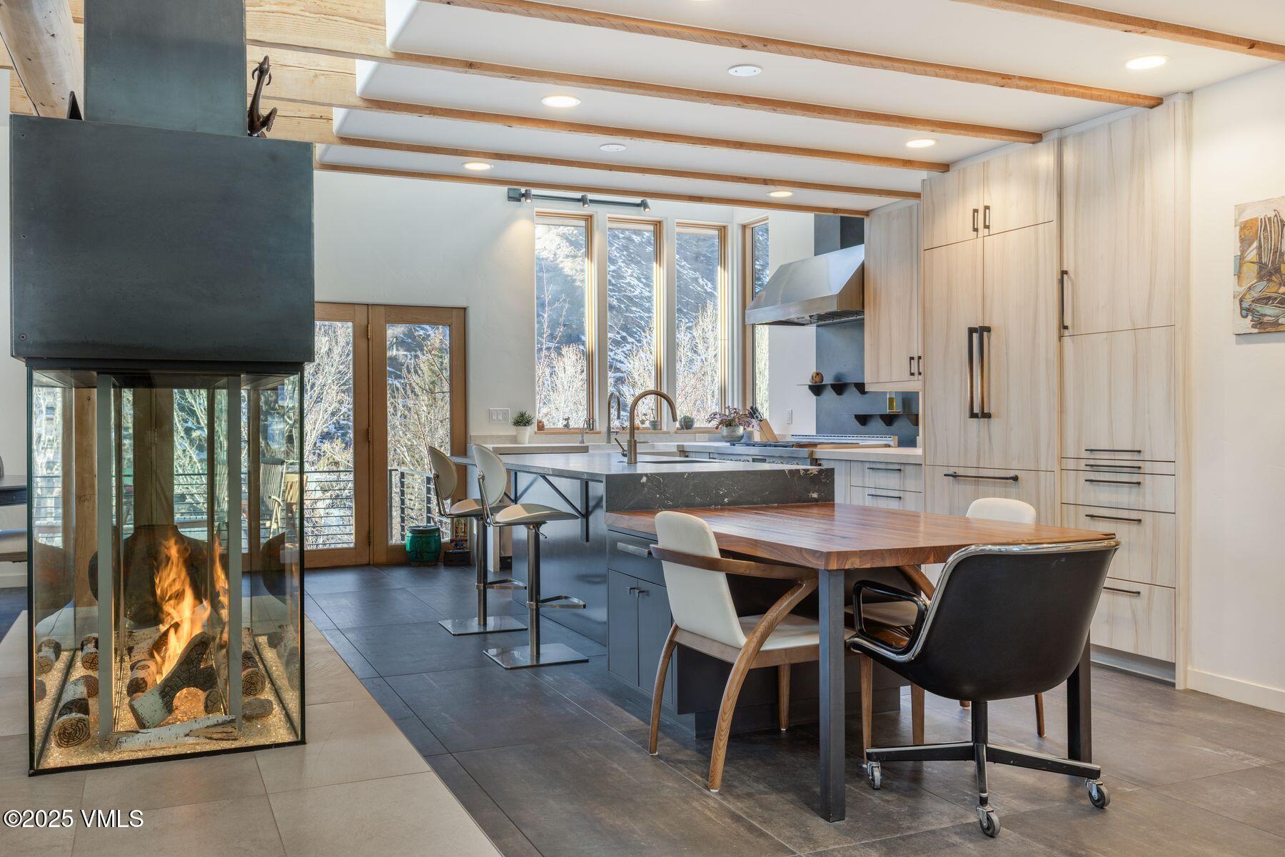 960 June Creek Road Edwards, CO 81632 - Photo 10 of 43 a view of a dining room with furniture window and outside view