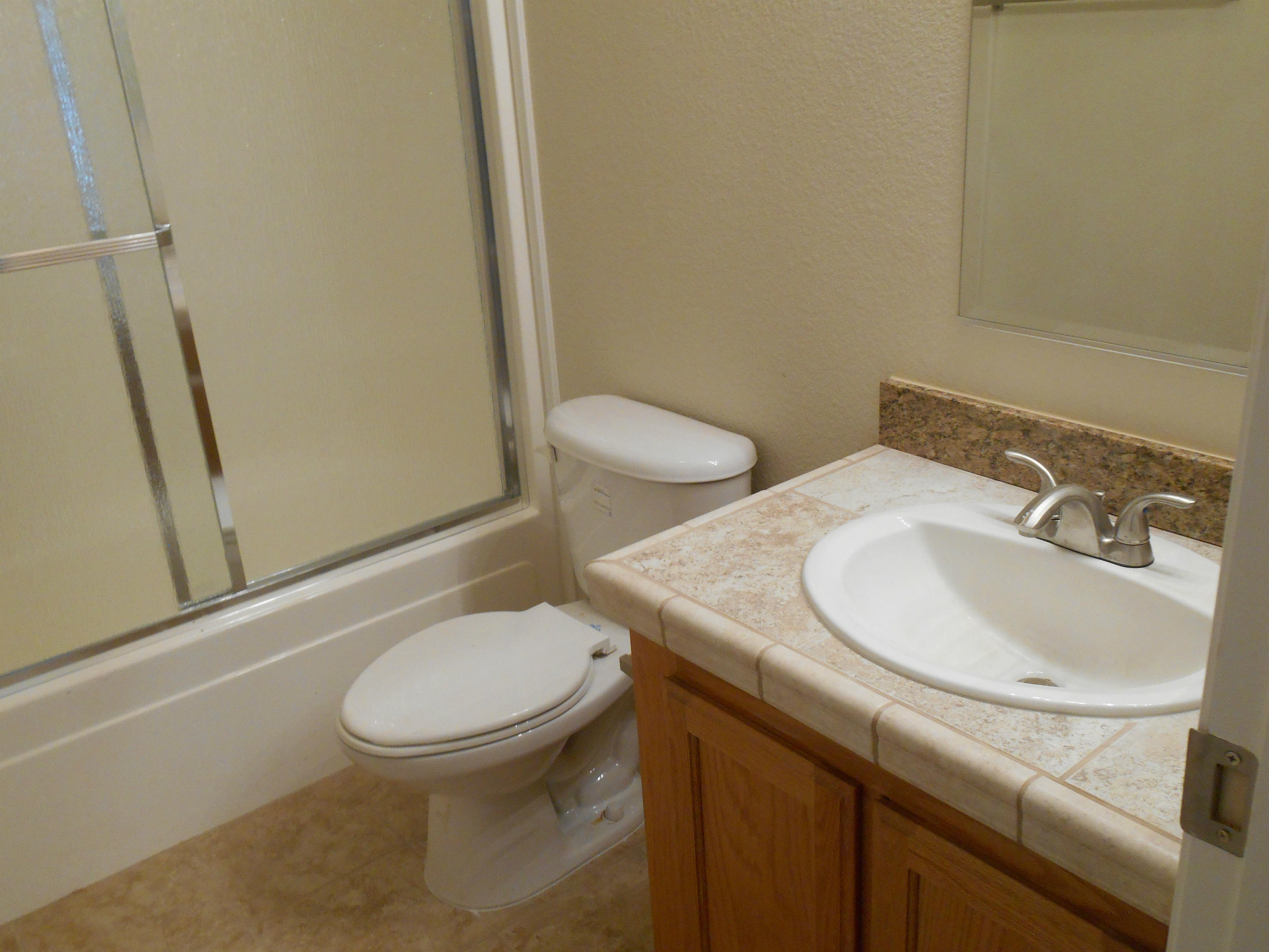 34699 Westward Ho Road Shingletown, CA 96088 - Photo 11 of 22 guest bath tile counter/floor
