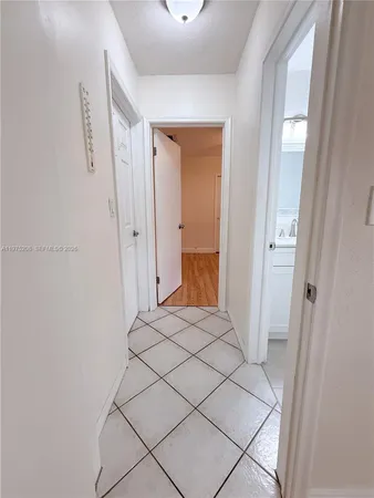 a bedroom with a bed and a shower