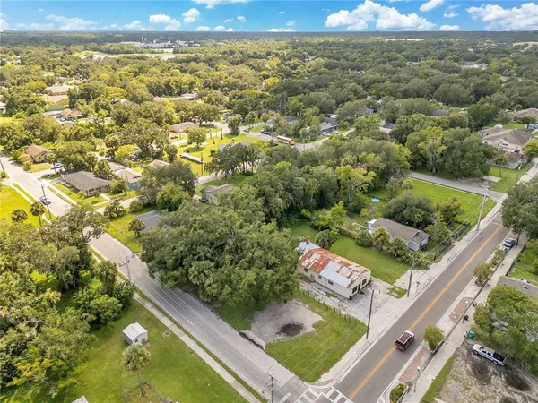 a view of outdoor space with trees all around