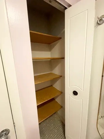 a view of a bench in the garden