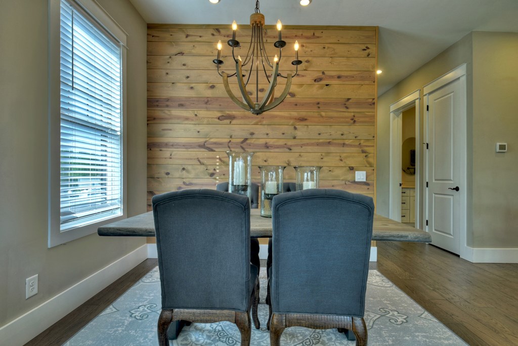 4 A Blue Ridge Street Blue Ridge, GA 30513 - Photo 11 of 31 a view of a dining room with furniture and wooden floor
