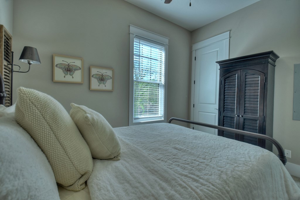 4 A Blue Ridge Street Blue Ridge, GA 30513 - Photo 23 of 31 a bed room with a bed and a window