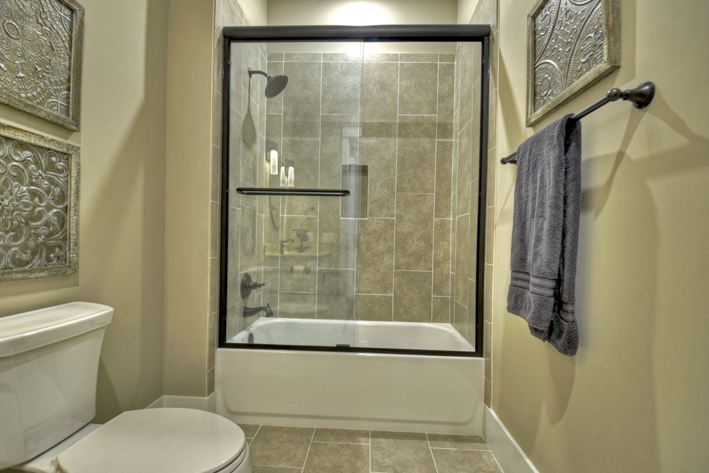 4 A Blue Ridge Street Blue Ridge, GA 30513 - Photo 25 of 31 a bathroom with a toilet and shower