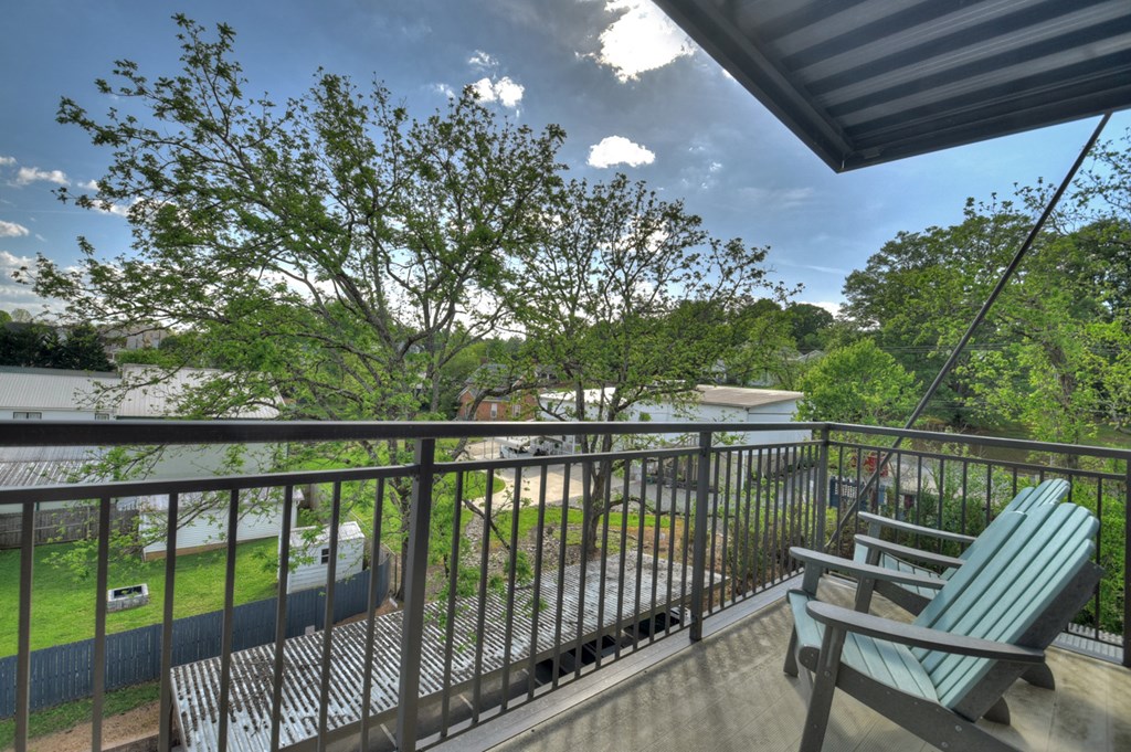 4 A Blue Ridge Street Blue Ridge, GA 30513 - Photo 6 of 31 a view of a balcony with wooden floor and outdoor seating