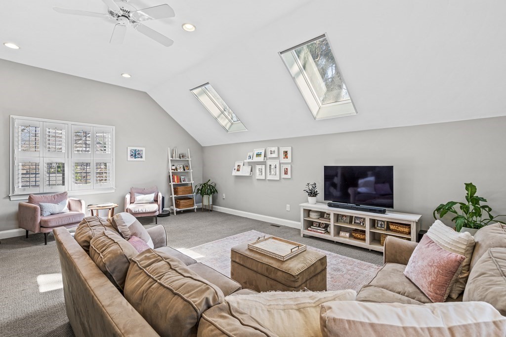 20 Walnut Street Needham, MA 02492 - Photo 11 of 27 a living room with furniture and a flat screen tv