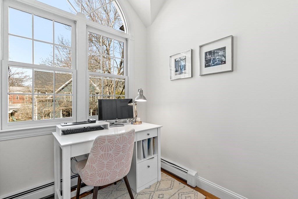 20 Walnut Street Needham, MA 02492 - Photo 13 of 27 a dining room that has a table and chair
