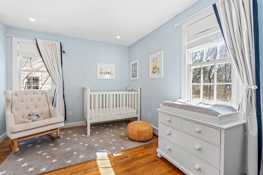 20 Walnut Street Needham, MA 02492 - Photo 16 of 27 a bedroom with a window and bed