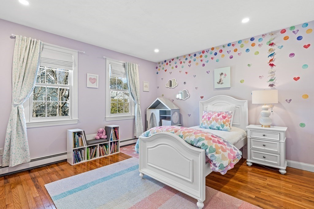 20 Walnut Street Needham, MA 02492 - Photo 17 of 27 a bedroom with a bed and a window