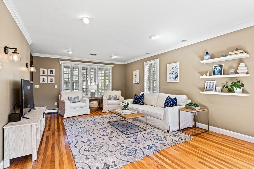 20 Walnut Street Needham, MA 02492 - Photo 9 of 27 a living room with furniture and a flat screen tv