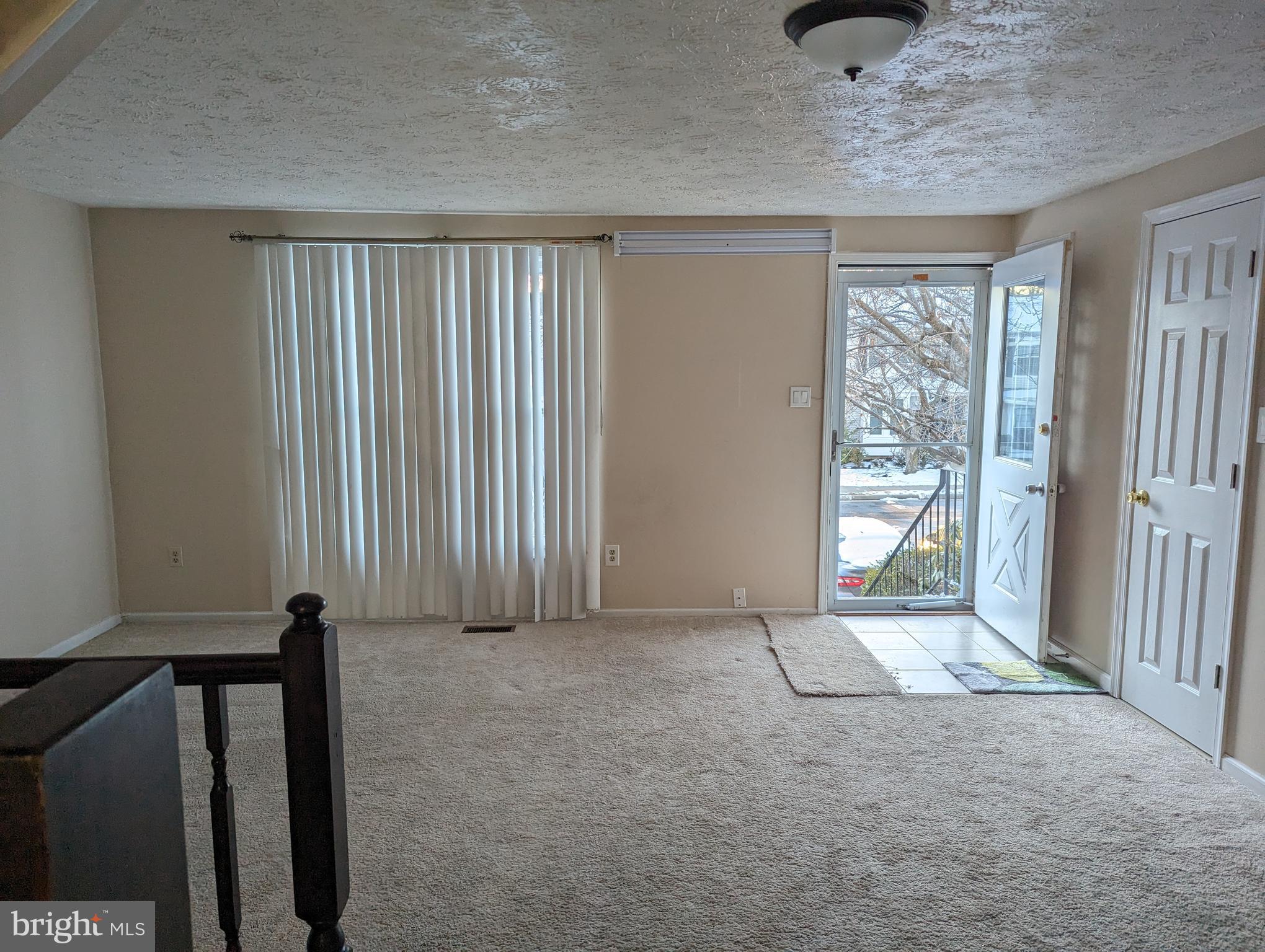 9119 Aspenpark Court Lorton, VA 22079 - Photo 15 of 32 an empty room with windows