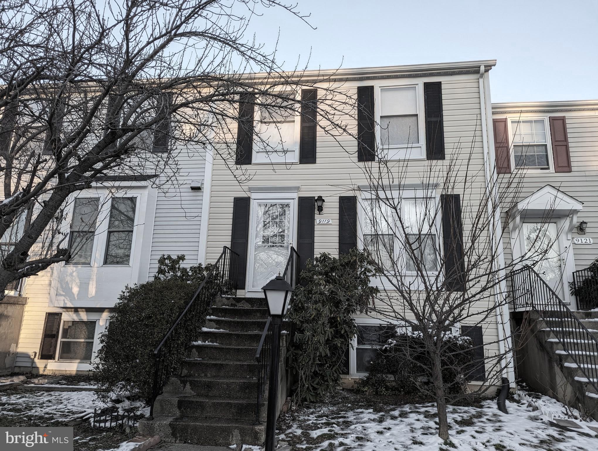 9119 Aspenpark Court Lorton, VA 22079 - Photo 16 of 32 a view of a house with a yard