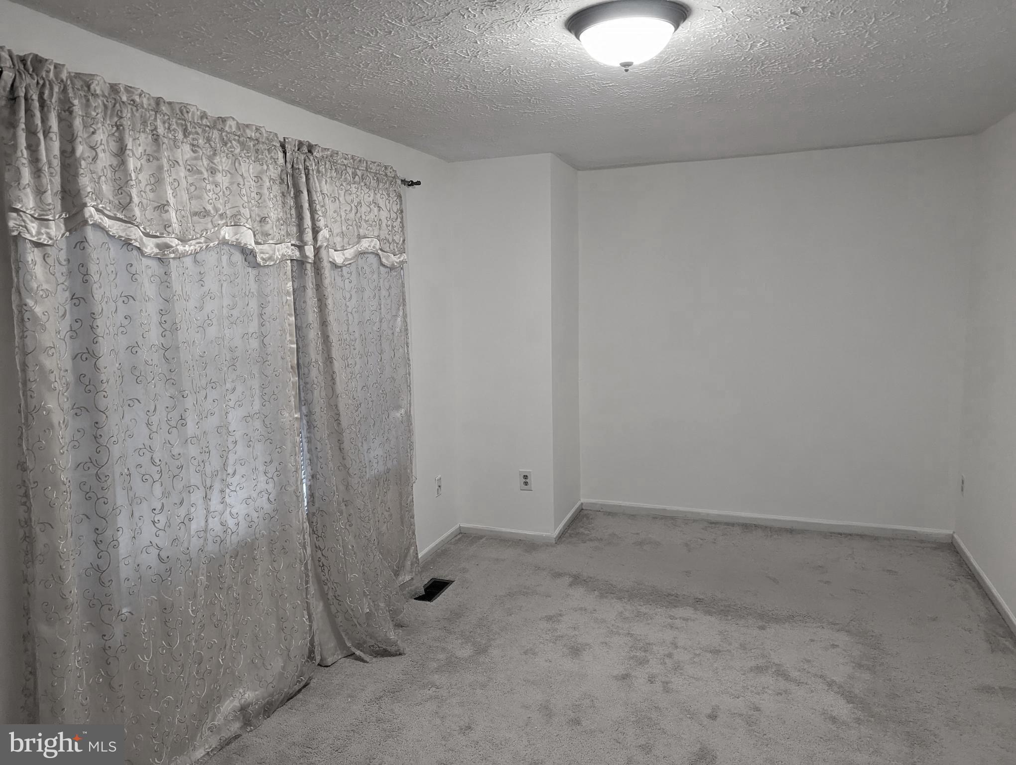 9119 Aspenpark Court Lorton, VA 22079 - Photo 17 of 32 a view of an empty room